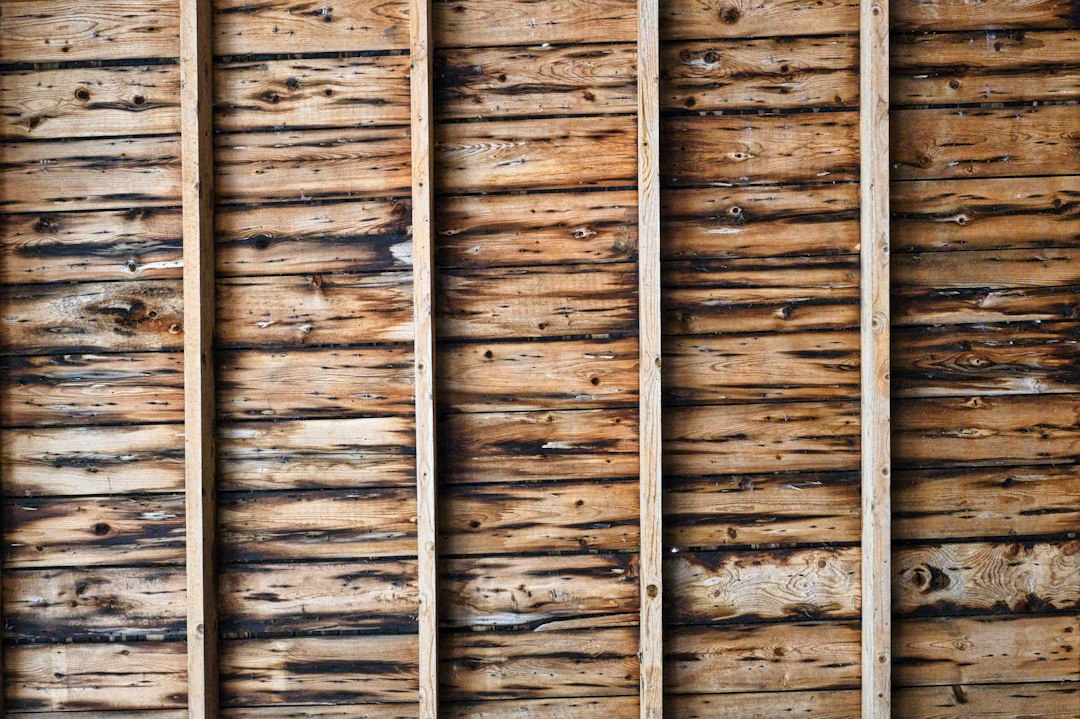a close up of a wooden wall made of boards